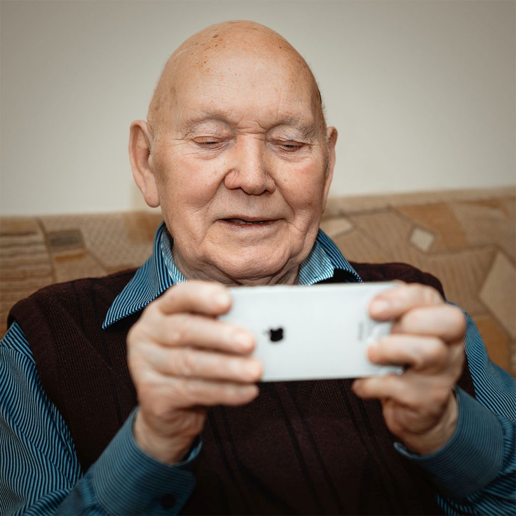 Resident looking at his phone
