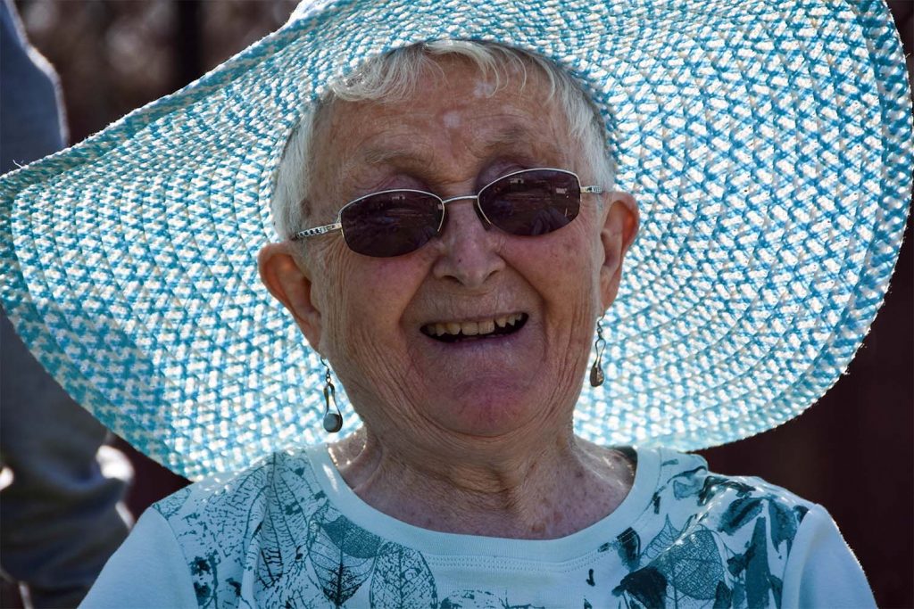 Resident happy with blue hat on
